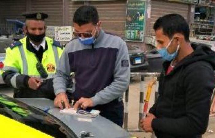حملات موسعة بمحاور القاهرة والجيزة لرصد مخالفى قواعد المرور